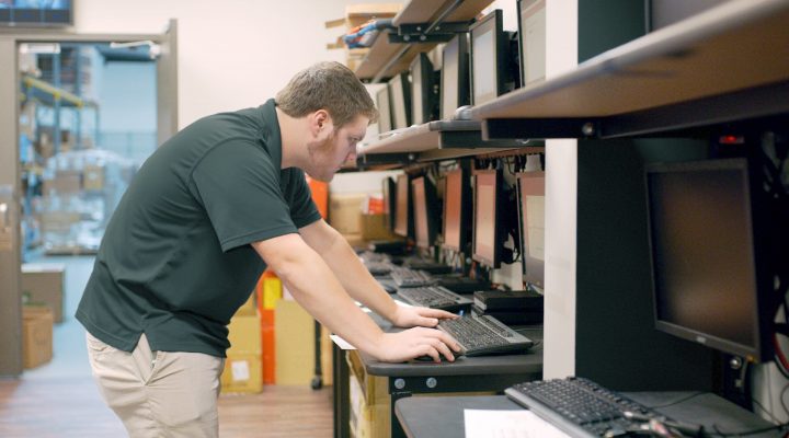 A technician provides legacy system updates on a computer in order to provide better restaurant security management.